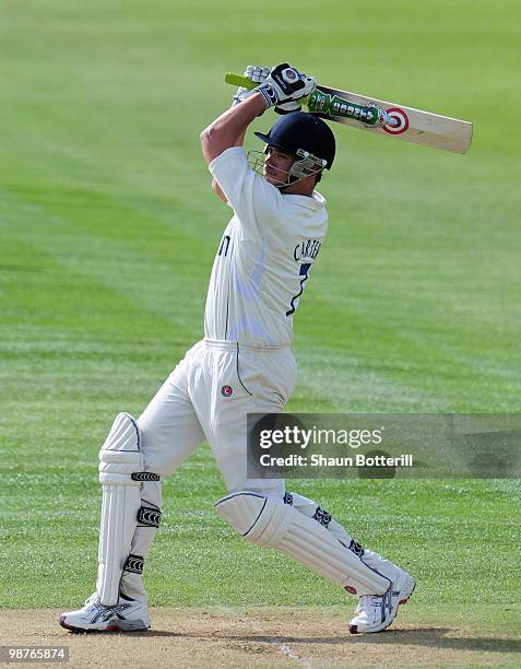 Neil Carter of Warwickshire plays a shot during the LV County Championship match between Warwickshire and Hampshire at Edgbaston on April 30, 2010 in...