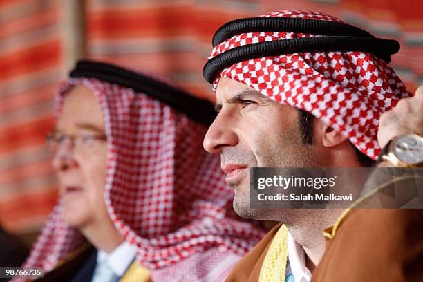 Goodwill Ambassador Luis Figo, dressed in traditional Jordanian arab clothing, sits in a tent during his visit to al-Noor hospital on April 30, 2010...