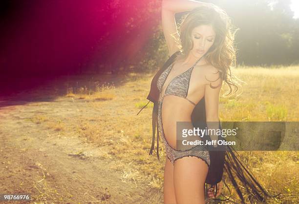 Actress Kayla Ewell poses at a portrait session for Maxim Magazine in 2009.