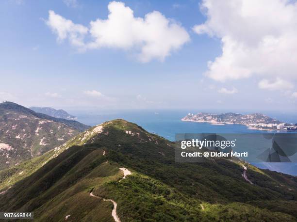 aerial view of the famous dragon back hiking trail in hong kong island on a sunny day - didier marti stock pictures, royalty-free photos & images