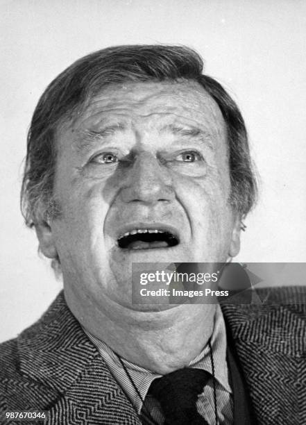 Actor John Wayne attends the Hasty Pudding Award at the Harvard Square Theatre in Cambridge, Massachusetts, circa January 1974.