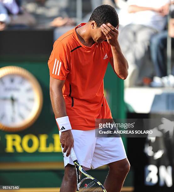 French Jo-Wilfred Tsonga reacts after losing a point against Spanish David Ferrer during their ATP Tennis Open match on April 30, 2010 in Rome....