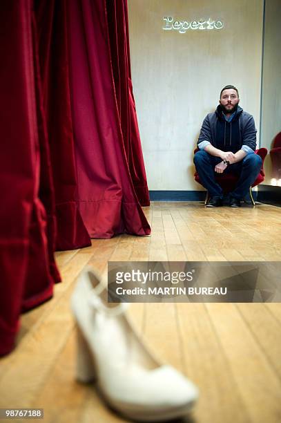 French ballet shoes company Repetto's designer Olivier Jault poses in front of a mirror on March 11, 2010 in Paris. Created in 1947 by Rose Repetto...