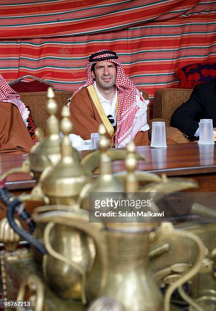 Goodwill Ambassador Luis Figo, dressed in traditional Jordanian arab clothing, sits in a tent during his visit to al-Noor hospital on April 30, 2010...