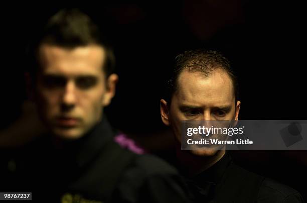 Graeme Dott of Scotland in action against Mark Selby of England during the semi final of the Betfred.com World Snooker Championships at The Crucible...