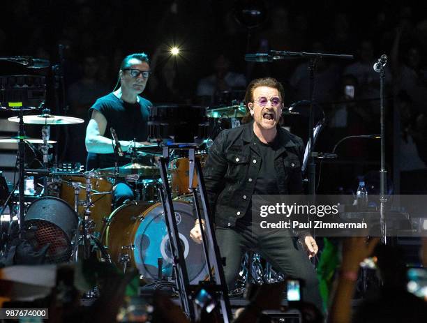 Larry Mullen, Jr. And Bono of U2 perform onstage during the eXPERIENCE + iNNOCENCE TOUR at Prudential Center on June 29, 2018 in Newark, New Jersey.