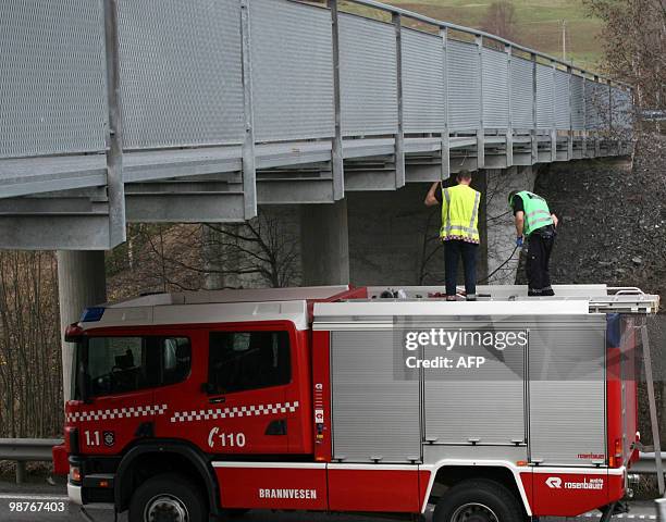 Rescue personnell investigate the site where a 15 year old French exchange student was killed in a bus accident at Roa, approximately 100km north of...