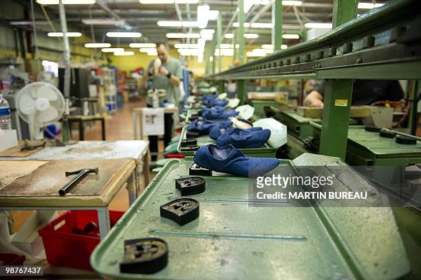 Shoes are displayed at the Repetto workshop on March 25, 2010 in Saint-Medard d'Excideuil, central France. Created in 1947 by Rose Repetto, at the...