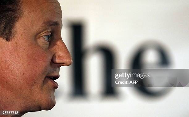 Britain's opposition Conservative Party leader David Cameron speaks during an election campaign visit to a community meeting in Hoylandswane, near...