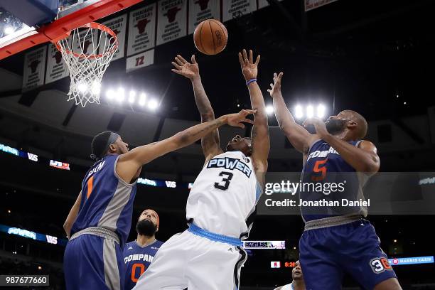 Quentin Richardson of Power shoots against DerMarr Johnson and Baron Davis of 3's Company during week two of the BIG3 three on three basketball...