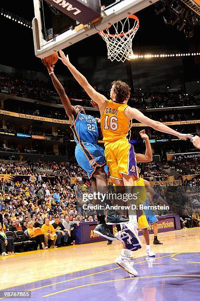 Jeff Green of the Oklahoma City Thunder lays the ball up against Pau Gasol of the Los Angeles Lakers in Game Five of the Western Conference...