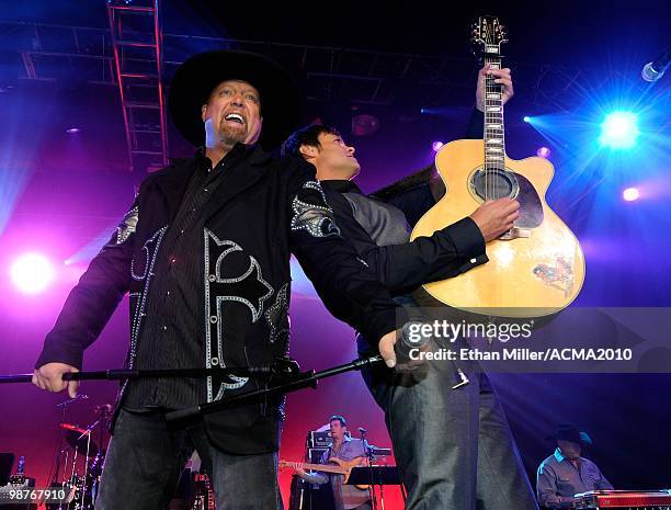 Eddie Montgomery and Troy Gentry of the duo Montgomery Gentry perform during the Academy of Country Music Awards All-Star Jam at the MGM Grand...