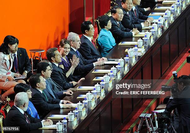 Turkmen President Gurbanguli Berdymukhamedov, Kenyan President Mwai Kibaki, French President Nicolas Sarkozy, his wife Carla Bruni-Sarkozy, President...