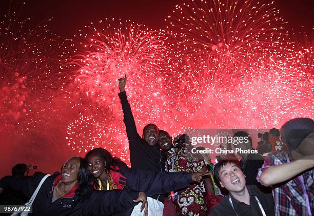 People watch fireworks during the opening ceremony of the 2010 World Expo on April 30, 2010 in Shanghai, China. More than 20 heads of state including...