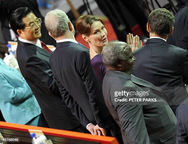 Chinese President Hu Jintao , French President Nicolas Sarkozy and his wife Carla Bruni attend the opening ceremony of the World Expo in Shanghai on...