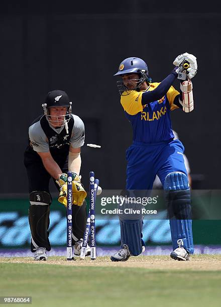 Tillakaratne Dilshan of Sri Lanka is clean bowled by Jacob Oram of New Zealand during The ICC T20 World Cup Group B match between Sri Lanka and New...