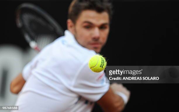 Swiss Stanislas Wawrinka eyes the ball as he plays against Spanish Rafael Nadal during their ATP Tennis Open match in Rome on April 30, 2010 in Rome....