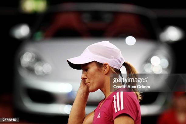 Justine Henin of Belgium reacts during her quarter final match against Jelena Jankovic of Serbia at day five of the WTA Porsche Tennis Grand Prix...
