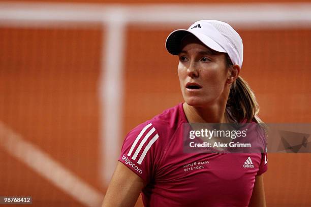 Justine Henin of Belgium reacts during her quarter final match against Jelena Jankovic of Serbia at day five of the WTA Porsche Tennis Grand Prix...