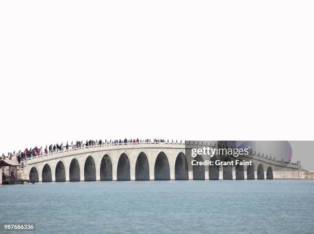 marble 17 arch bridge over kunming lake. - kunming lake stock pictures, royalty-free photos & images