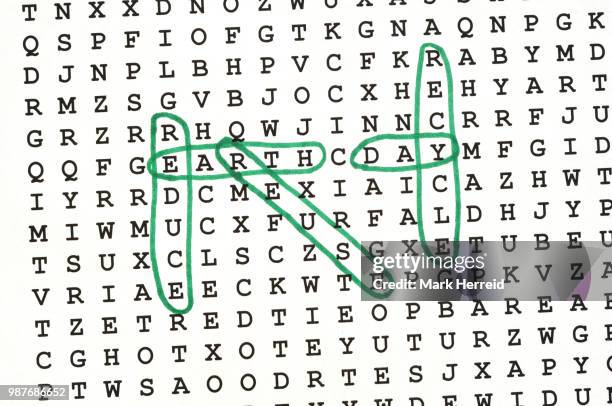 earth day" word search puzzle - almanac publication stock pictures, royalty-free photos & images