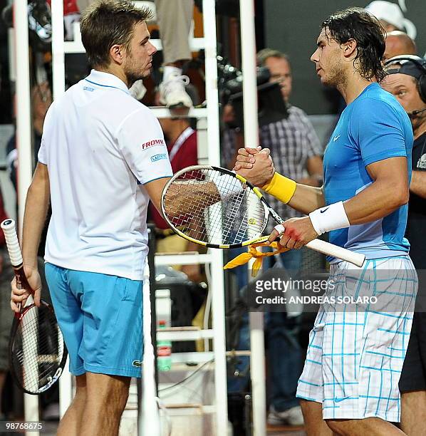 Spanish Rafael Nadal shakes hands with Swiss Stanislas Wawrinka at the end of their ATP Tennis Open match in Rome on April 30, 2010. Nadal won 6-4...
