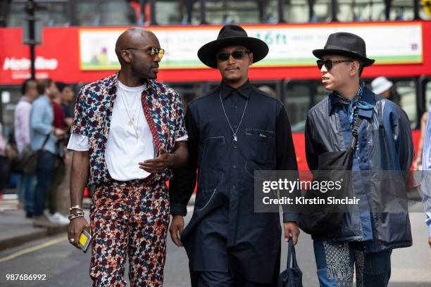 Fashion Editor and founder of Sagaboi Geoff K Cooper wears an Afriek shirt and trousers and a John Lawrence Sullivan T shirt with Digital Influencer...