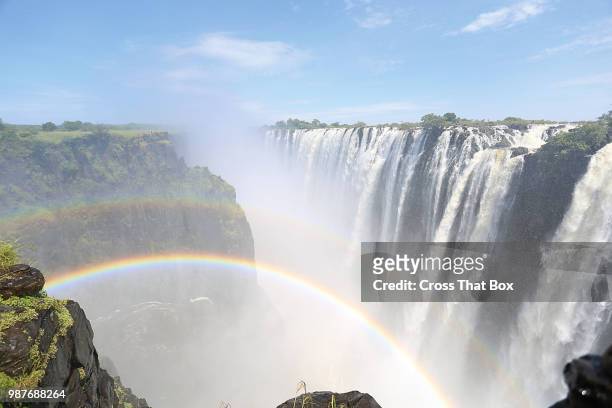 double rainbow- victoria falls - victoria falls stock pictures, royalty-free photos & images