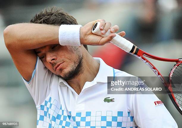 Swiss Stanislas Wawrinka reacts after losing a point against Wawrinka Spanish Rafael Nadal during their ATP Tennis Open match on April 30, 2010 in...