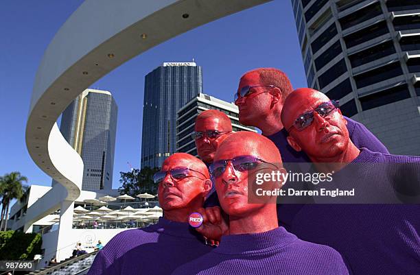 The Red Men pose for a photo with the Brisbane skyline in the background at the launch of the 2001 Goodwill Games entertainment and cultural festival...