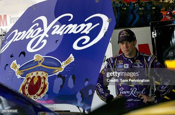 Matt Kenseth, driver of the Crown Royal Ford, looks on in the garage during practice for the CROWN ROYAL Presents the Heath Calhoun 400 at Richmond...