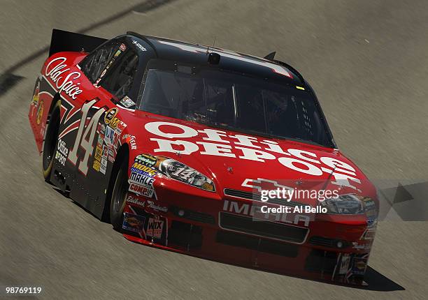 Tony Stewart, driver of the Office Depot / Old Spice Chevrolet, drives on track during practice for the CROWN ROYAL Presents the Heath Calhoun 400 at...