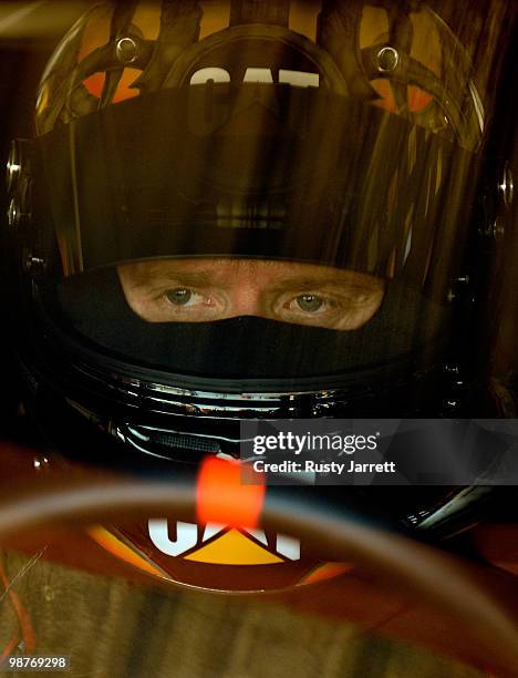 Jeff Burton, driver of the Caterpillar Chevrolet prepares to drive during practice for the NASCAR Sprint Cup Series CROWN ROYAL Presents the Heath...