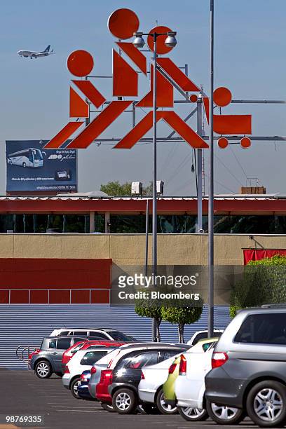 Cars are parked in the lot outside a Chedraui store in Mexico City, Mexico, on Friday, April 30, 2010. Mexican retailer Grupo Comercial Chedraui SAB...