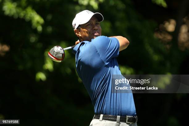 Tiger Woods hits a tee shot on the 5th hole during the second round of the Quail Hollow Championship at Quail Hollow Country Club on April 30, 2010...