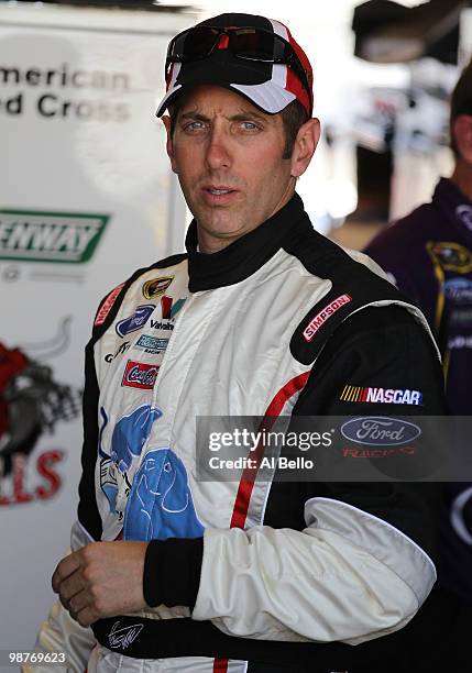 Greg Biffle, driver of the 3M Ford, looks on during practice for the Sprint Cup Series CROWN ROYAL Presents the Heath Calhoun 400 at Richmond...