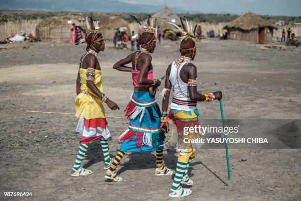 Dancers of the Samburu tribe walk around after their performance durning the 11th Marsabit Lake Turkana Culture Festival in Loiyangalani near Lake...