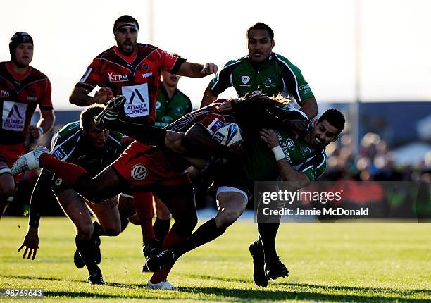 Gabiriele Lovobalavu of Toulon is tackled by Frank Murphy of Connacht during the Amlin Challenge Cup Semi-Final match between Connacht and Toulon at...