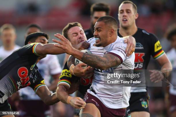 Frank Winterstein of the Sea Eagles is tackled during the round 16 NRL match between the Penrith Panthers and the Manly Sea Eagles at Panthers...