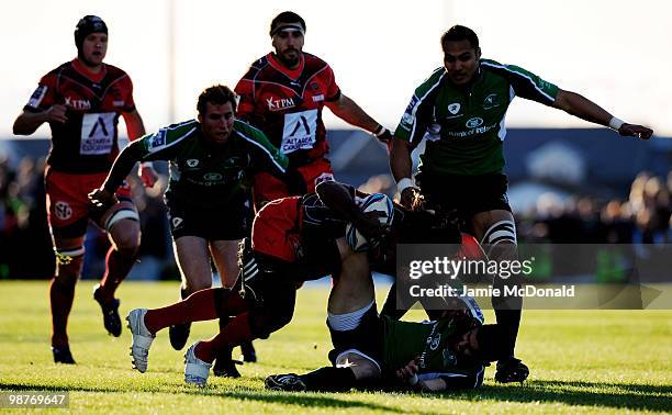 Gabiriele Lovobalavu of Toulon is tackled by Frank Murphy of Connacht during the Amlin Challenge Cup Semi-Final match between Connacht and Toulon at...