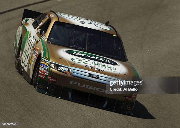 Carl Edwards driver of the Scotts EZ Seed car drives during practice for the NASCAR Sprint Cup Series CROWN ROYAL Presents the Heath Calhoun 400 at...