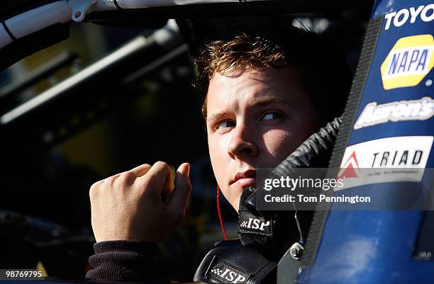 Trevor Bayne, driver of the Diamond-Waltrip Racing Toyota, looks on during practice for the Nationwide Series BUBBA burger 250 at Richmond...