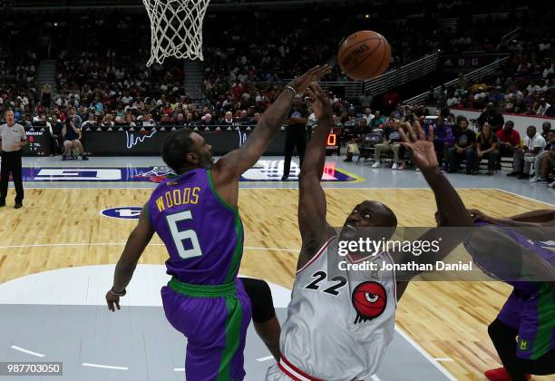 Qyntel Woods of 3 Headed Monsters blocks a shot by Dion Glover of Trilogy during week two of the BIG3 three on three basketball league at United...