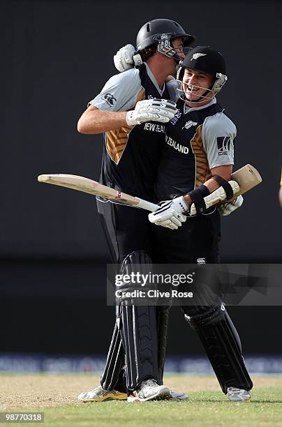 Nathan McCullum of New Zealand celebrates with Tim Southee after hitting the winning runs in the ICC T20 World Cup Group B match between Sri Lanka...