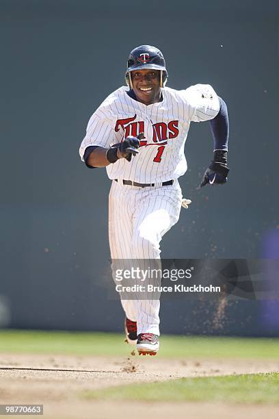 Orlando Hudson of the Minnesota Twins advances to third base against the Cleveland Indians on April 22, 2010 at Target Field in Minneapolis,...