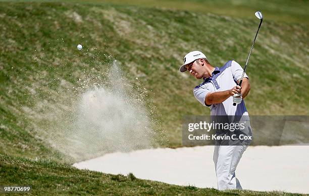 Kevin Chappell chips out of the sand onto the 18th green during the second round of the 2010 Stadion Athens Classic at the University of Georgia Golf...