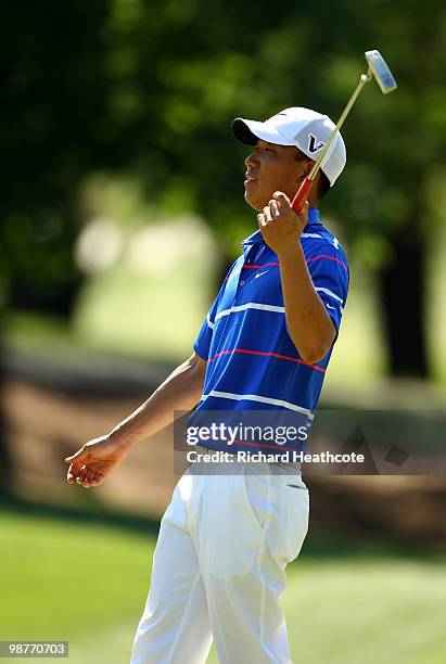 Anthony Kim reacts as his eagle putt just misses the hole on the 5th green during the second round of the Quail Hollow Championship at Quail Hollow...