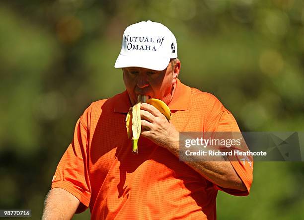 Billy Mayfair eats a banana as he walks off the 6th tee during the second round of the Quail Hollow Championship at Quail Hollow Country Club on...