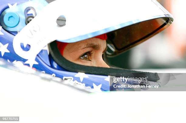 Danica Patrick sits in her Go Daddy.com Andretti Autosport Honda Dallara during practice for the Indy Car Series Road Runner Turbo Indy 300 on April...