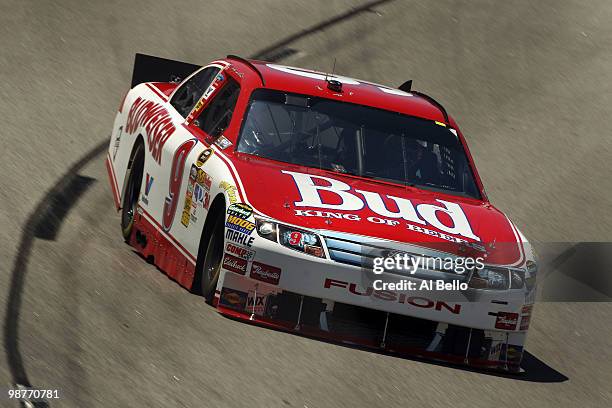 Kasey Kahne, driver of the Budweiser 25th Anniversary Ford, drives during practice for the NASCAR Sprint Cup Series CROWN ROYALO Presents the Heath...